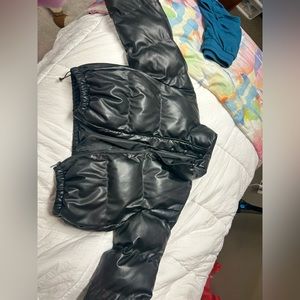 Selling this black leather puffer jacket because I never wear it